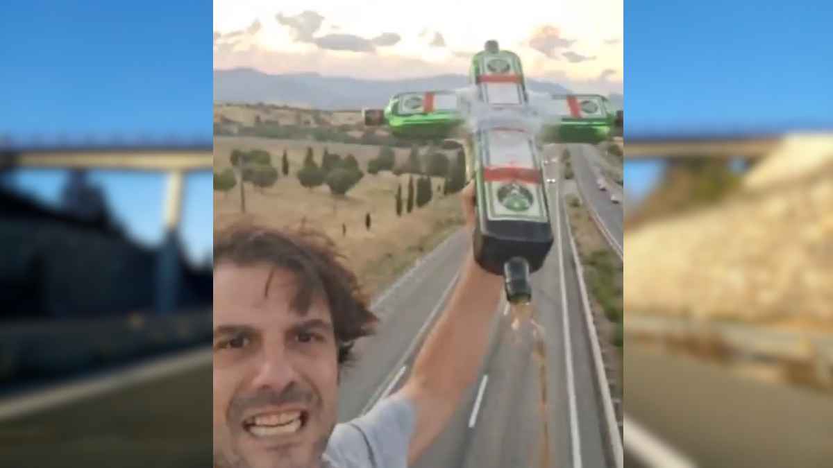 Hombre tirando una botella de Jägermeister desde un puente en la autovía, incidente en pleno tráfico.