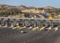Peaje en la autovía Madrid-Barcelona: cabinas con coches, coste de 19 euros por turismo.