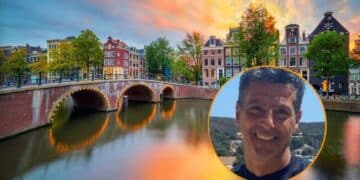 Profesional mayor de 50 años sonríe junto a un canal holandés tras triplicar su sueldo en Países Bajos.