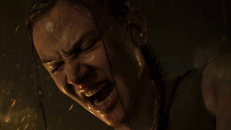 Abby gritando en una escena de The Last of Us Part II, mostrando una expresión de dolor o angustia.