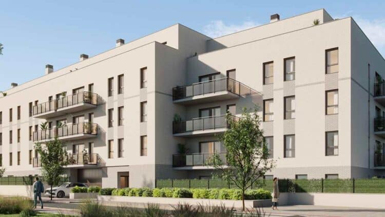 Fachada de modernas viviendas asequibles en el nuevo barrio de Alovera, a 45 minutos de Madrid con playa urbana.