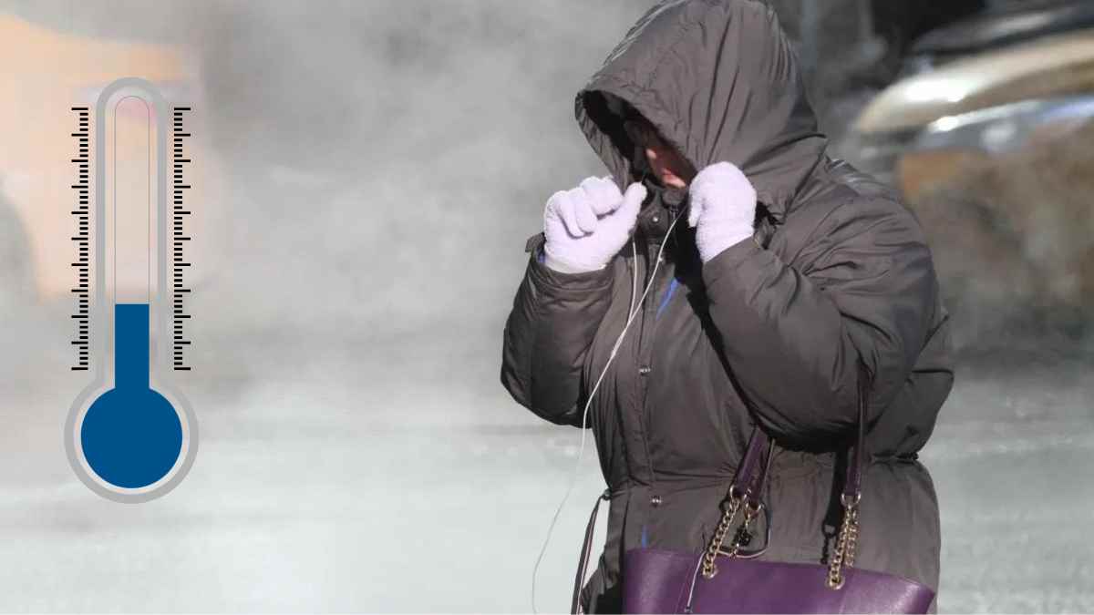 Persona abrigada durante la ola de frío en Madrid con temperaturas mínimas de 2 grados y lluvias intensas.