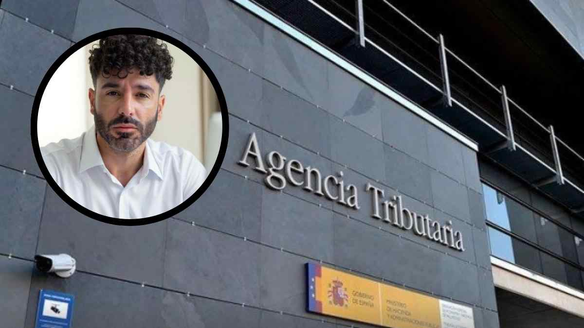 Fachada de la Agencia Tributaria con la imagen de un hombre en un recuadro circular.