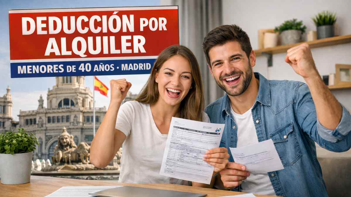 Pareja joven celebrando la deducción por alquiler para menores de 40 años en Madrid durante la declaración de la Renta