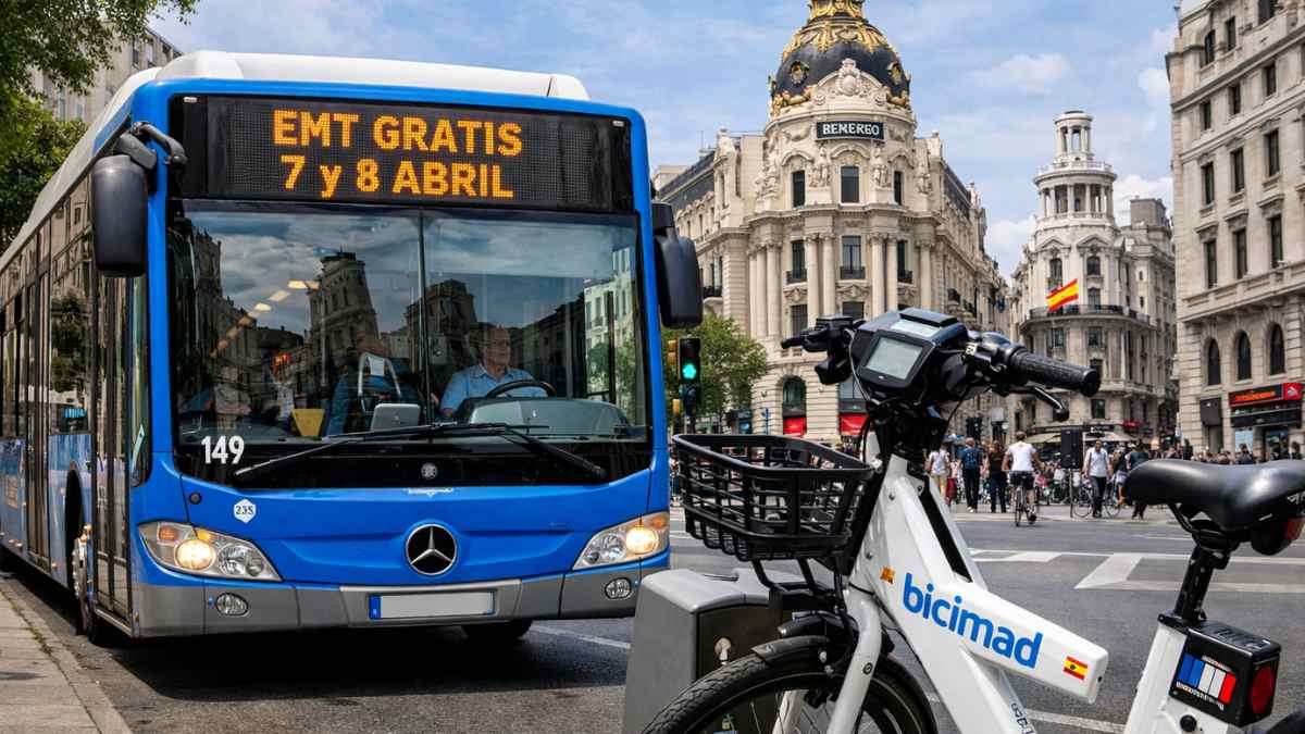 Autobús EMT gratis en Madrid junto a bici bicimad durante la campaña de transporte gratuito en abril